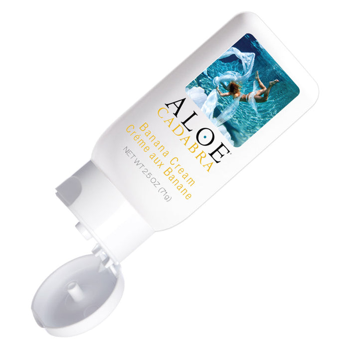 Aloe Cadabra Banana cream organic natural lubricant in an open white squeeze bottle.