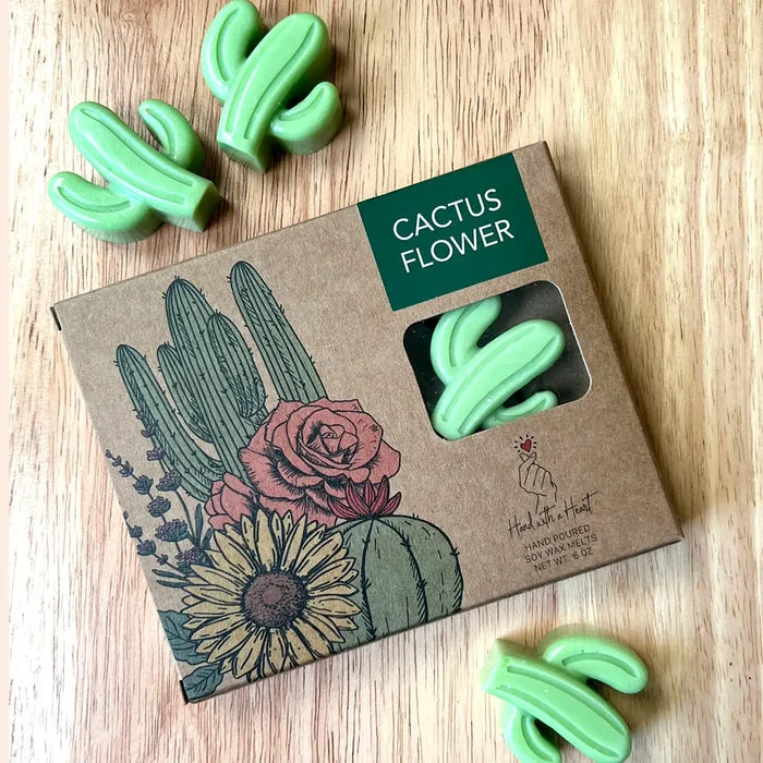 Cactus Flower wax melts in green cactus shapes beside a brown box with a green label and cactus art