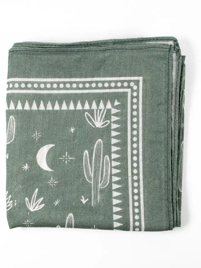 Cactus Print Cotton Bandana in sage green with white cactus motifs and a bordered pattern.