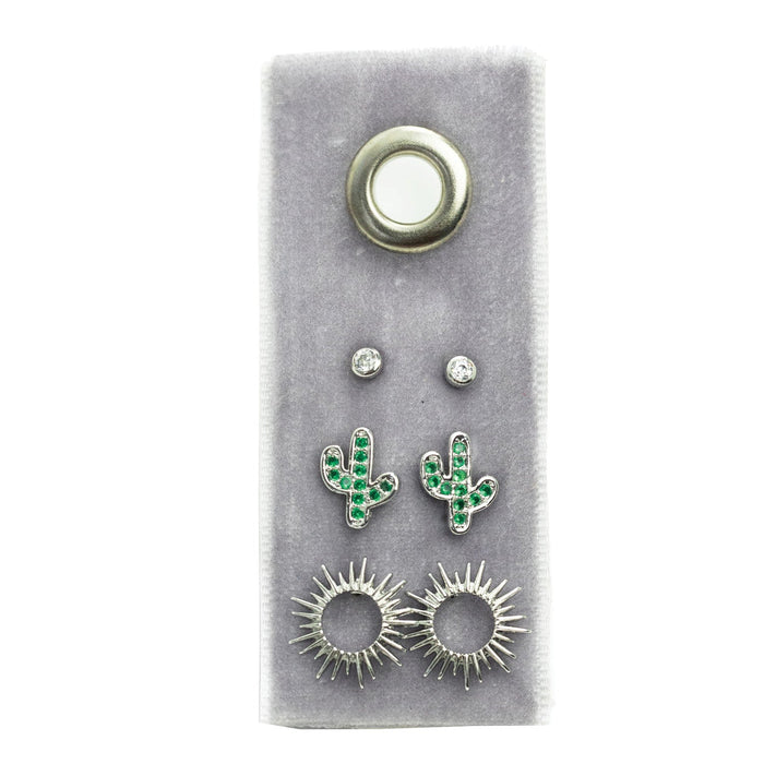 Cactus Stud Gift Set on gray display featuring diamond studs, green cactus charms, and sunburst earrings