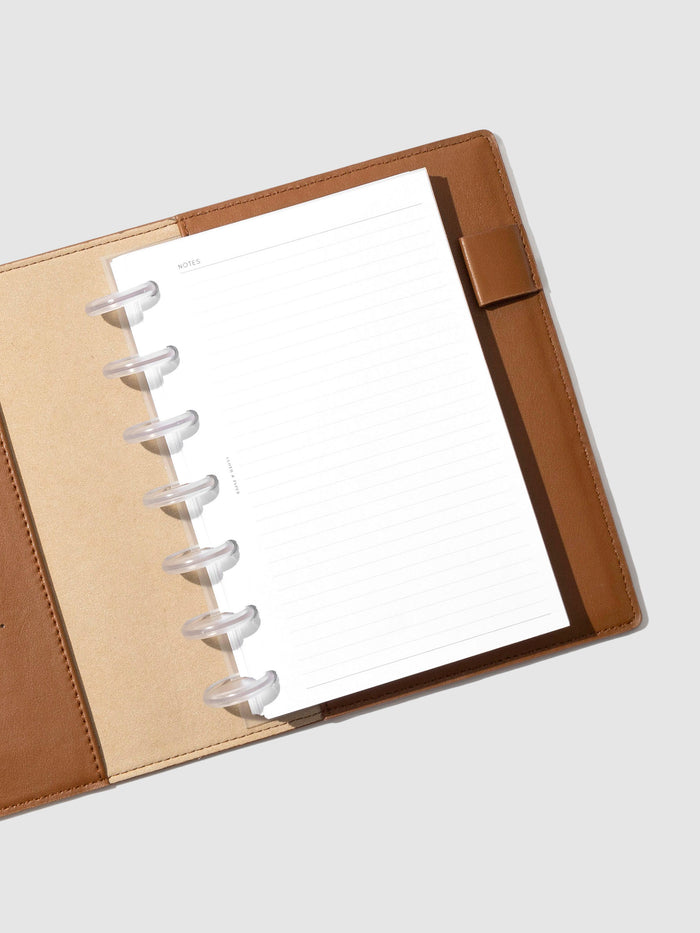 Folio displayed opened on a neutral background. Color shown is clay brown.