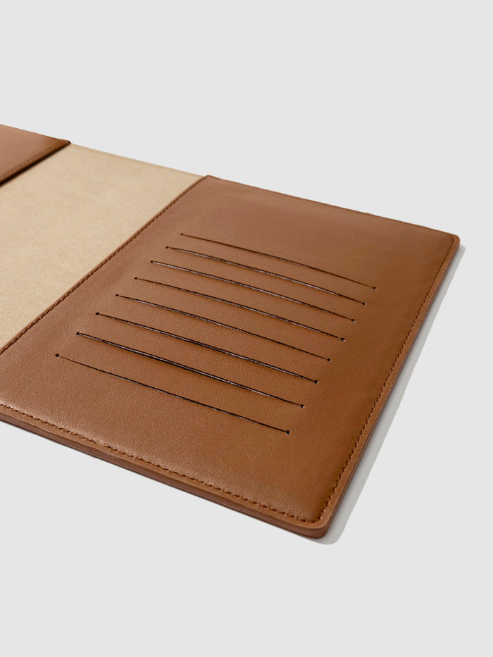 Closeup of folio's credit card slots. Color pictured is clay brown.