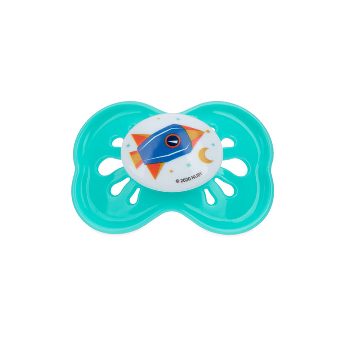 The Classic Oval Pacifier in turquoise (large) features a round white center with a colorful rocket ship, stars, and crescent moon design; its hygienic air system helps soothe and comfort fussy babies.