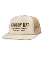 Cream trucker hat with brown embroidered COWBOY HAT on the front panel and beige mesh back