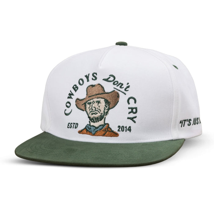 White cap with green brim and Cowboys Don't Cry embroidery of a cowboy portrait on the front.