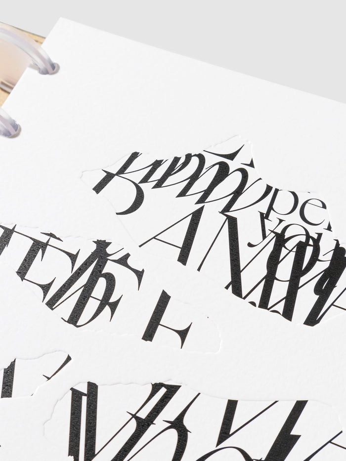Closeup of dashboard inside a leather folio showing its debossed accents.