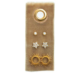 Flower Stud Gift Set on velvet displays a large round bezel stud, two small crystal studs, two star shaped crystal studs, and sunburst earrings