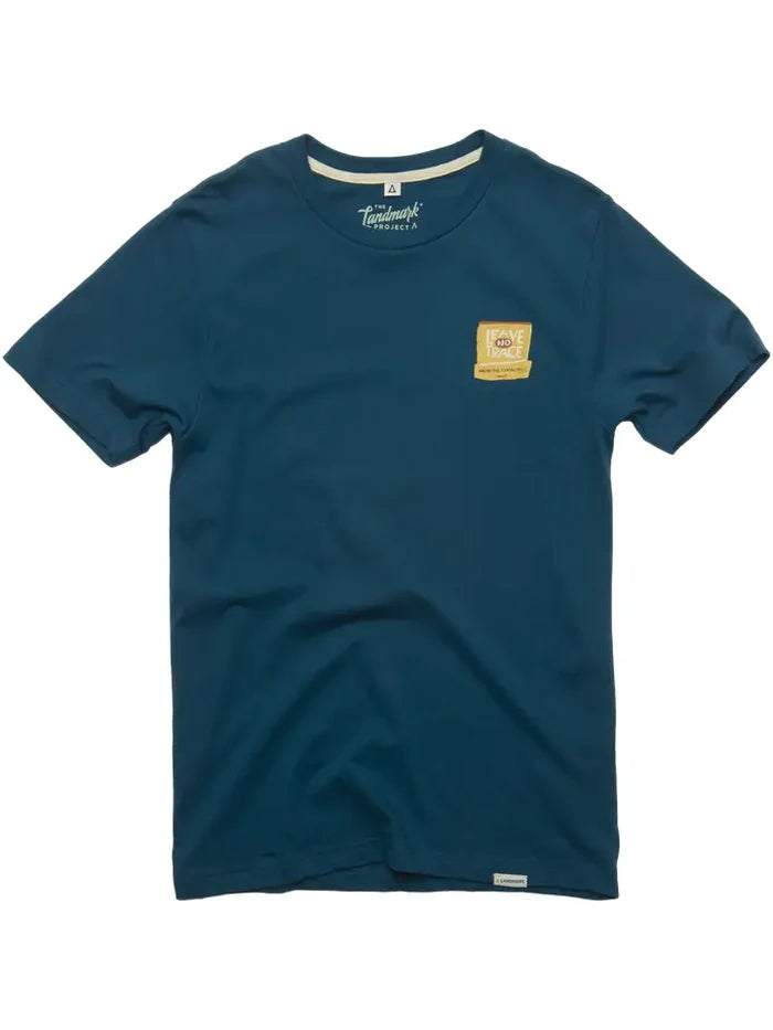 Teal short sleeve tee with a yellow Leave No Trace patch on the left chest