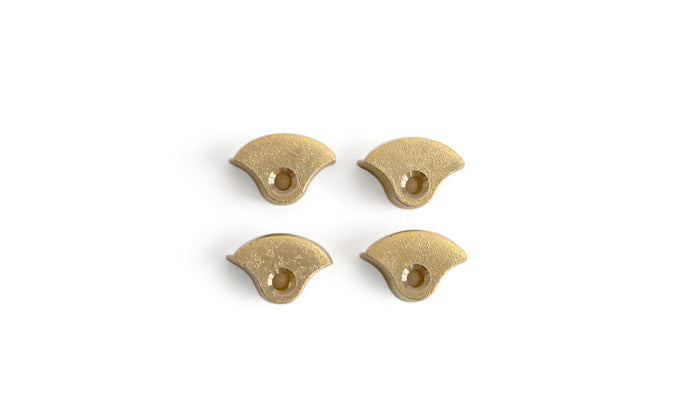 Silhouetted matureware mirror mounting holders against white background.