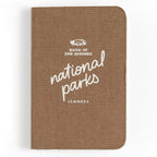Brown fabric covered One Hundred National Parks Journal with white script title.