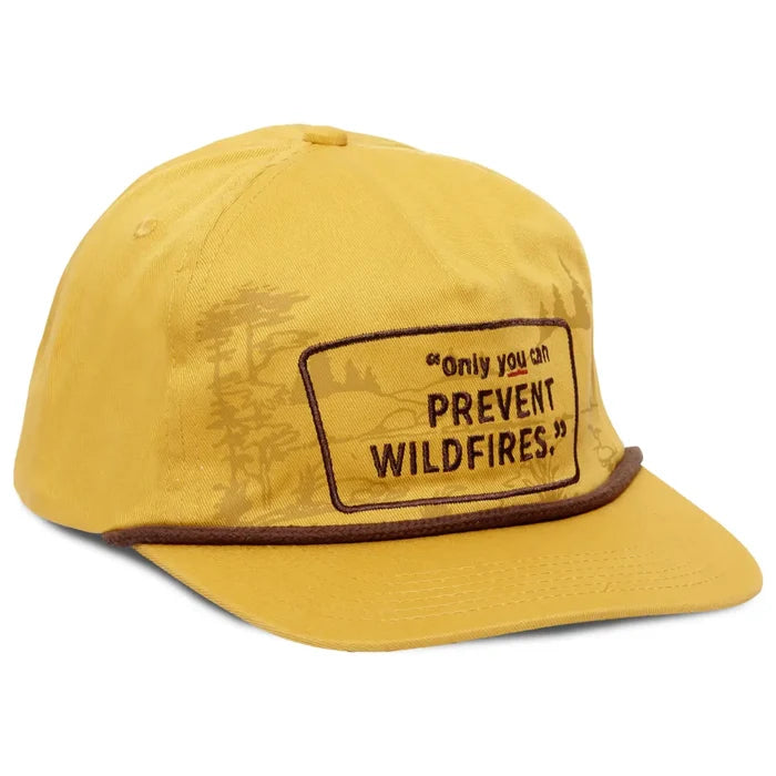 Yellow cap with a brown rope trim and a patch reading only you can prevent wildfires.
