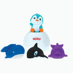 The Penguin Pop-Up Bath Toy features four colorful animals—a blue whale, black and white orca, purple dolphin, and blue penguin—placed on a white Nuby igloo for fun bath time that encourages hand-eye coordination and learning.