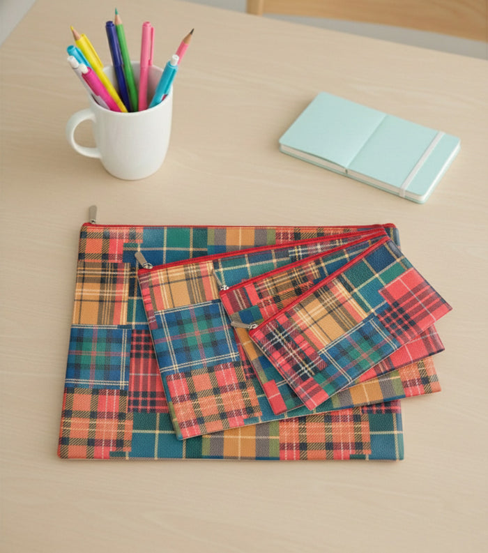 Tartan check zip pouch set with assorted pouches on desk, multi-pocket design