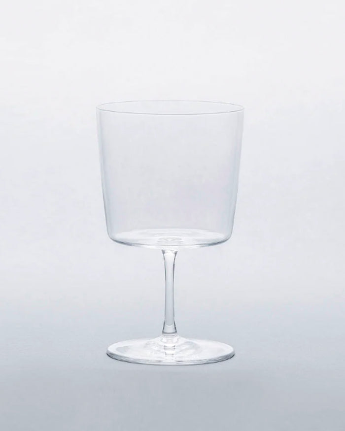 Time and style raisin glass against gray background.