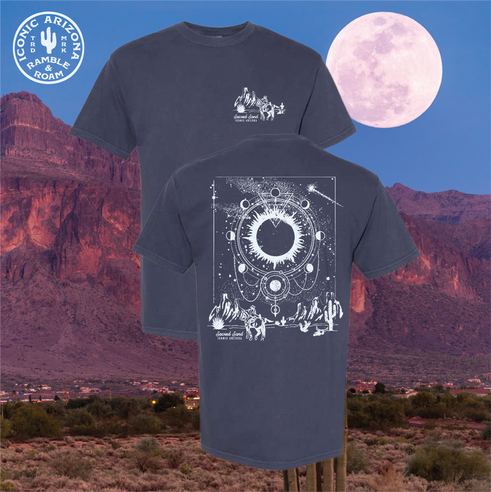 Dark tee with a white Sacred Sands logo circle on the left chest featuring a cactus and Iconic Arizona branding