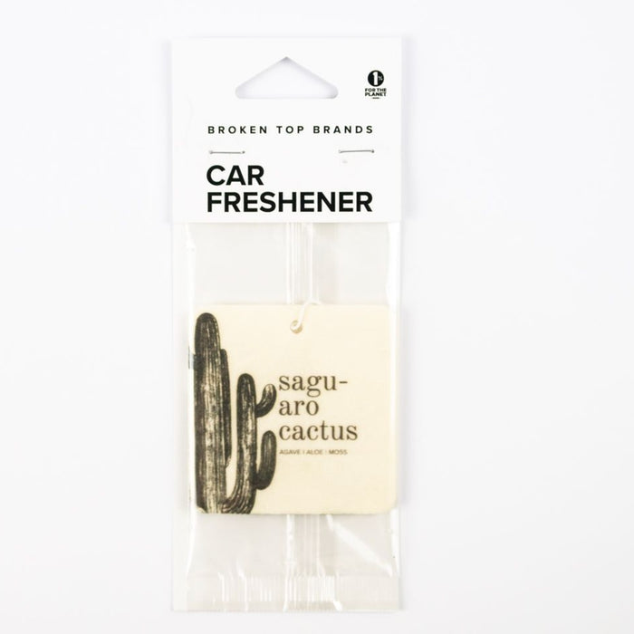 Saguaro cactus car freshener in clear packaging with a beige tag featuring a cactus drawing