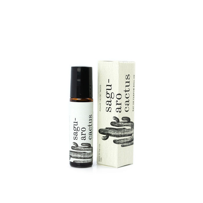 Saguaro Roll-On perfume bottle beside its cream box with a cactus graphic