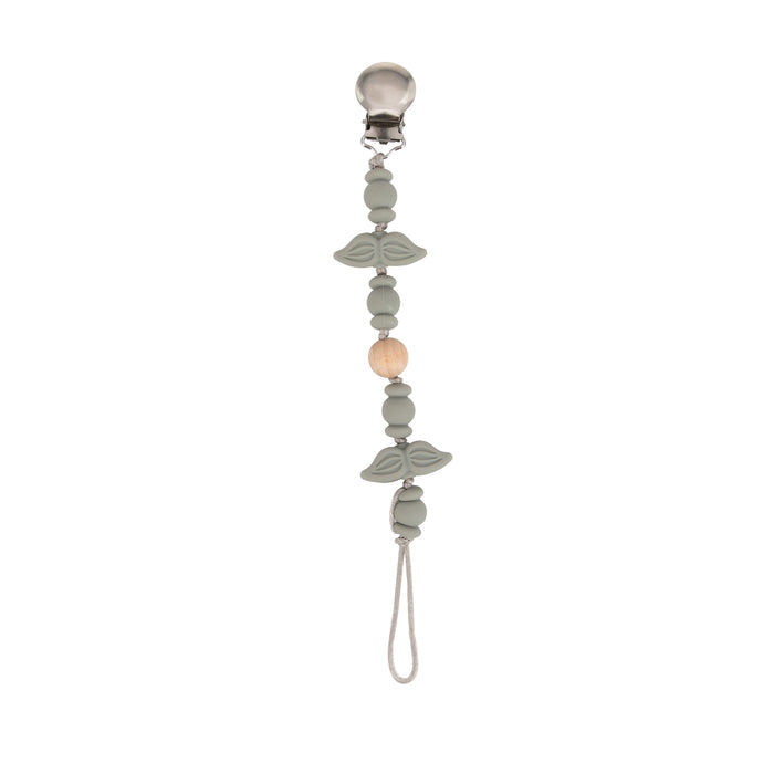 The Silicone and Wood Beaded Pacifier Clip features sage green silicone and wooden beads, two leaf accents, a natural wood bead, a sturdy metal clip on top, and a bottom loop for attaching your pacifier holder.