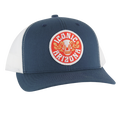 Navy blue curved brim trucker hat with white mesh and round patch showing a skull surrounded by flowers and Iconic Arizona text.