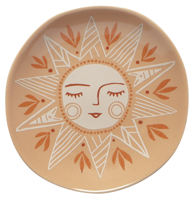 Round Soleil Sun Trinket Tray plate with a white sun face on peach background.