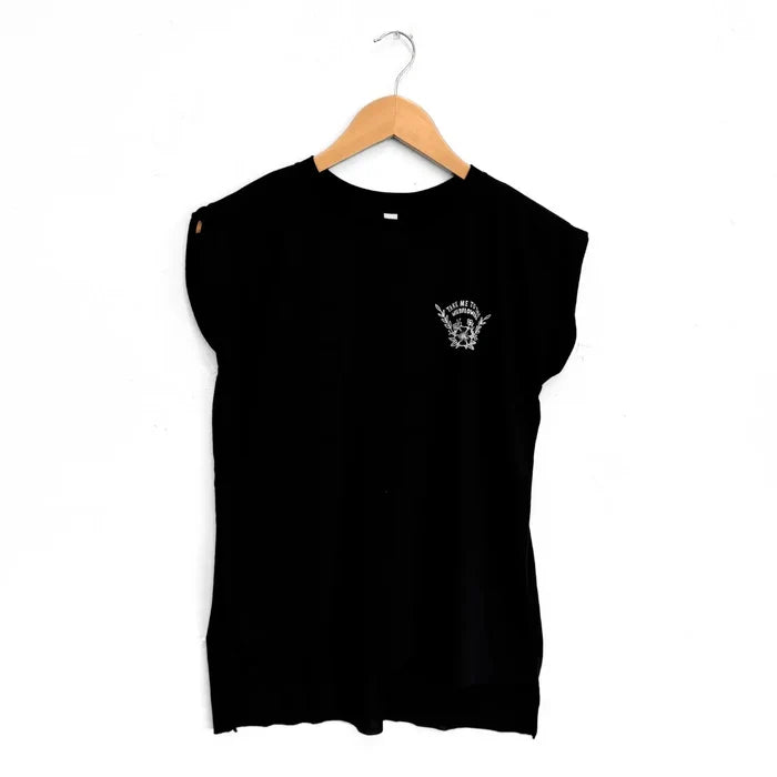 Black short sleeve tee with a small white chest logo of mountains and wildflowers.