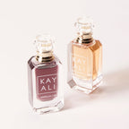 Two perfume bottles by Kayali on a white background